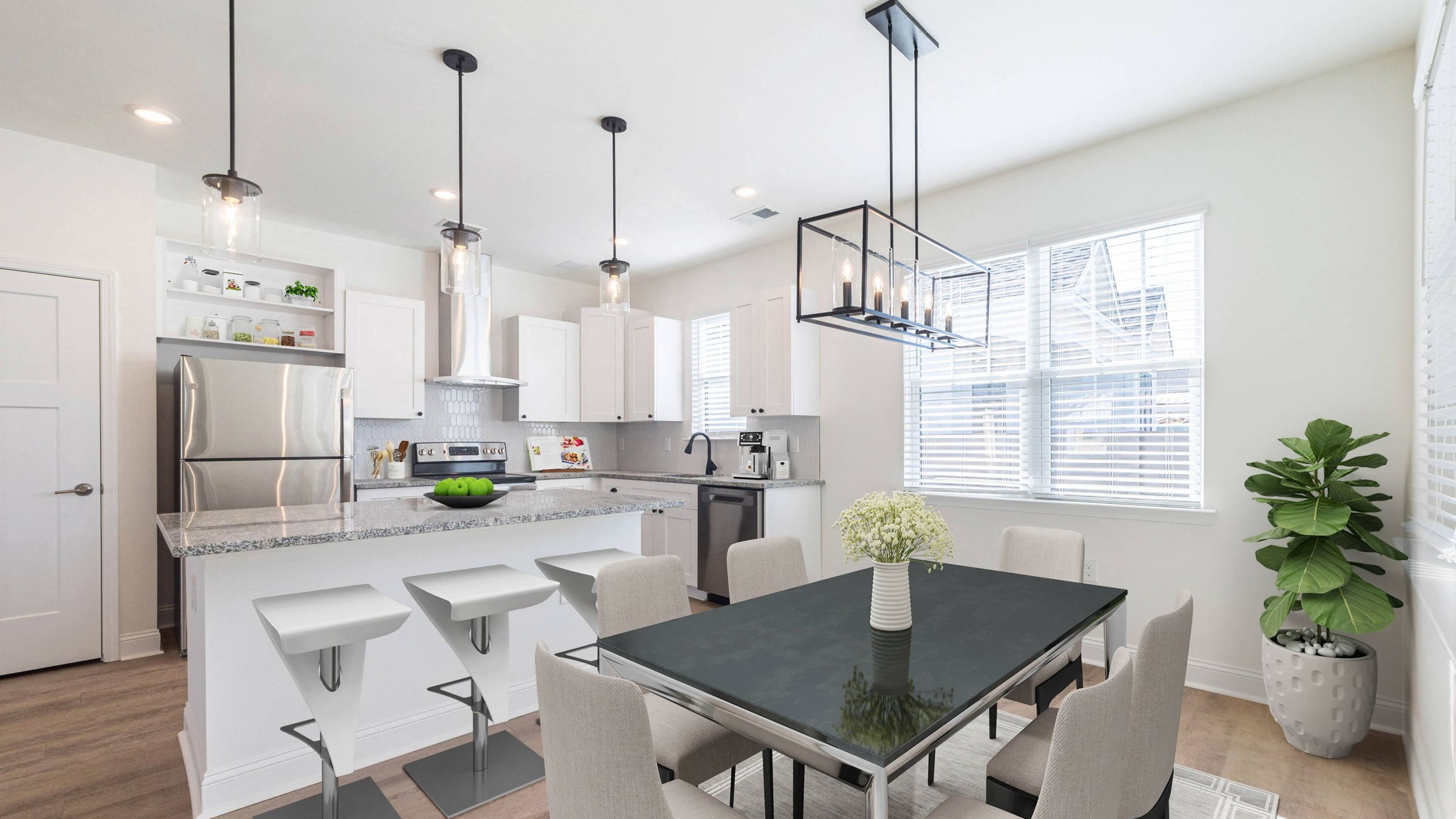 Hawthorne Cottages at Leland luxury kitchen with island, pendant lighting, stainless steel appliances, and custom cabinetry in for rent home